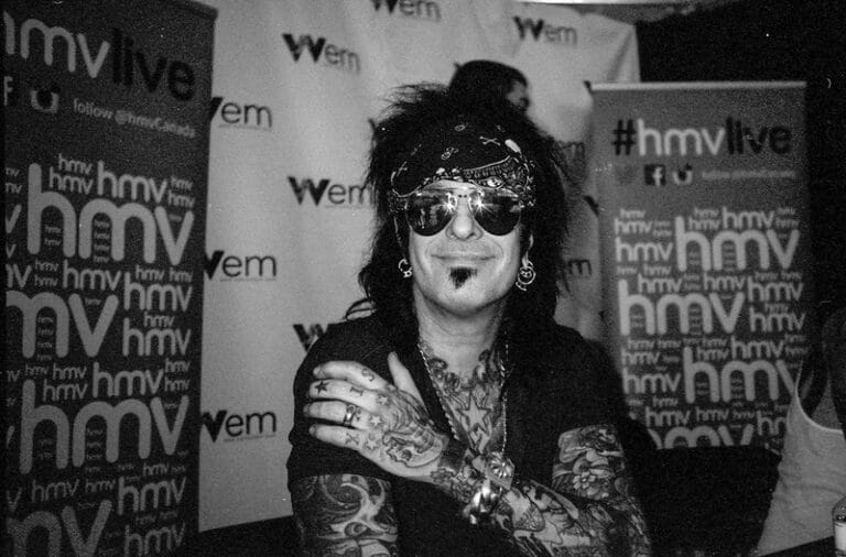 Nikki Sixx during an HMV video shoot captured with a pocket film camera