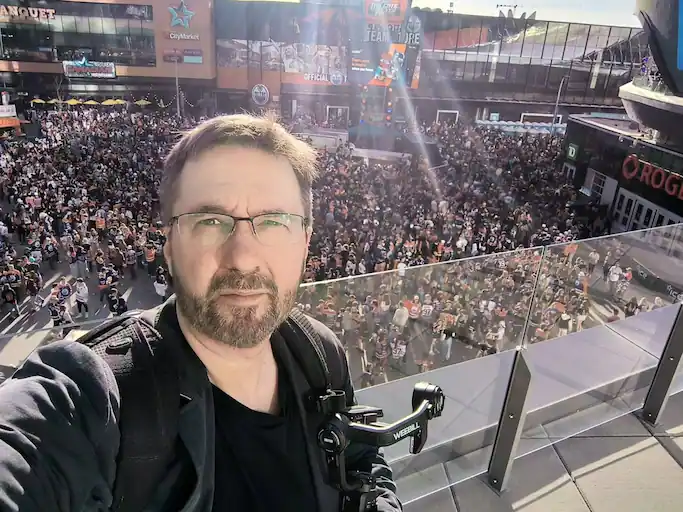 David Mathew Bonner filming at Rogers Place in Edmonton during playoff hockey